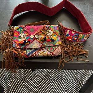 Sun shoulder bag with embroidery, faux leather fringe , and shells. Beautiful.